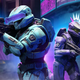 Two Spartans wearing cyberpunk accessories patrol the streets in the Streets map in Halo Infinite while playing the Attrition mode.